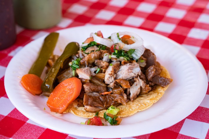taco de carnitas with pickled chiles.