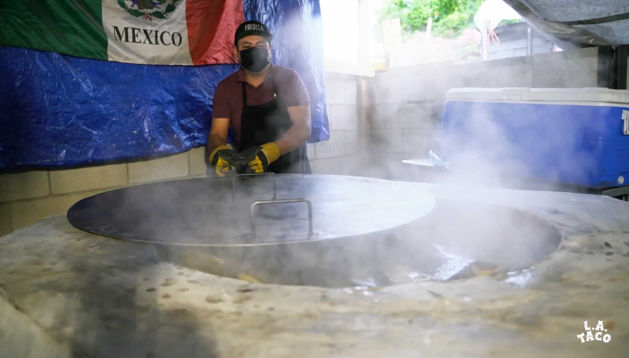 Daniel Torres takes the lid off his giant Morelos style oven.